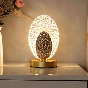Modern Elegant Peacock-Inspired Table Lamp with Textured Oval Design