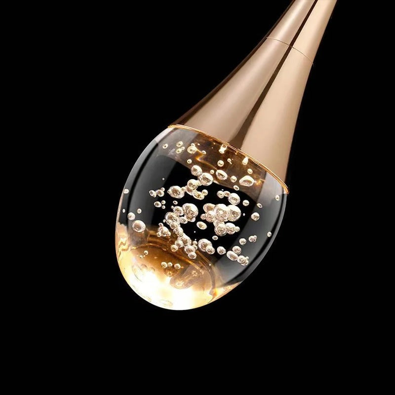 Modern LED Wall Light with Teardrop Glass Pendant and Gold Accent – Warm Ambient Glow
