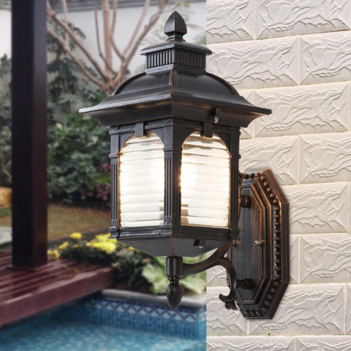 Vintage-Inspired Antique Glass Outdoor Wall Lantern with Ornate Metalwork