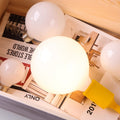 LED Light Bulb | Frosted Glass & Metal | Soft Warm Glow | Modern Living Room