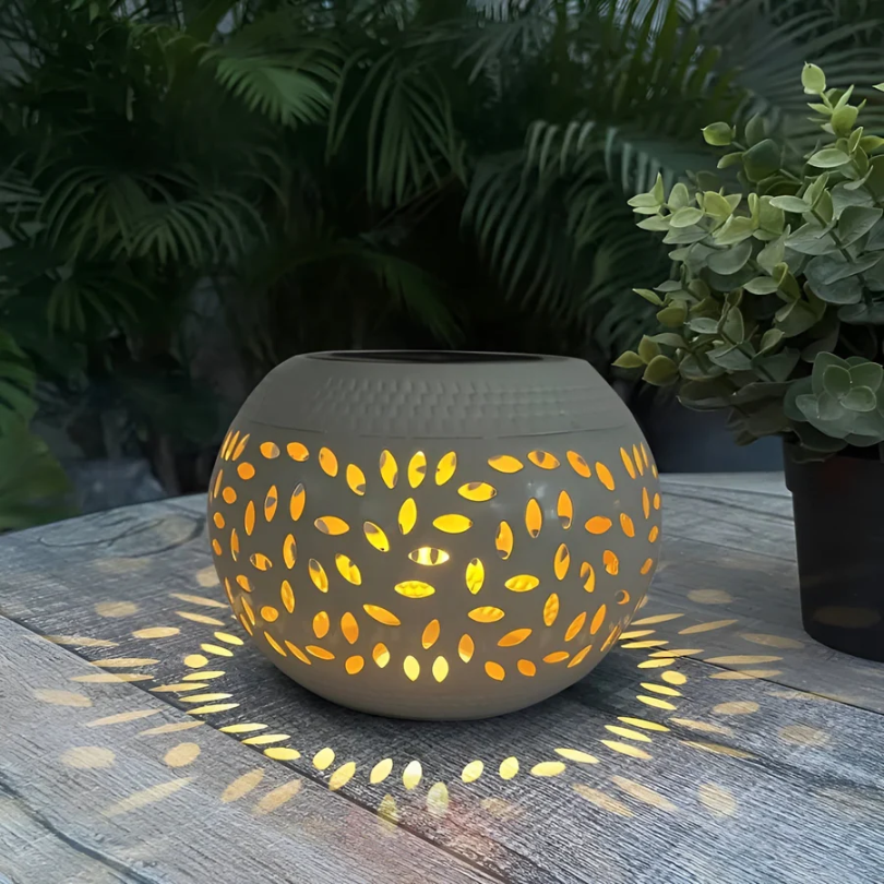 Solar-Powered Decorative Lantern with Leaf Cut-Out Pattern for Gardens